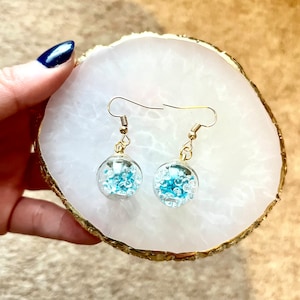 Glow in the dark blue green bauble style earrings