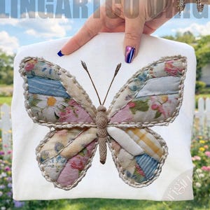May include: A white square textile featuring a large butterfly applique. The butterfly has wings made of patchwork fabric in floral and striped patterns, with a beige rope outline. The text "FEELINGARTCO ORIGINAL" is visible.
