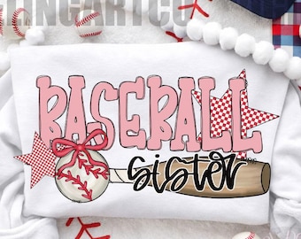 May include: White sweatshirt with the words "Baseball Sister" in pink, a baseball graphic, and a baseball bat. The design includes a red bow and a star with a gingham pattern. Baseball-themed apparel.