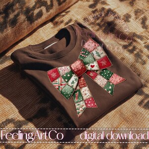 May include: A brown sweatshirt with a large, colorful bow design. The bow is made of patchwork squares in red, green, and pink, with holiday-themed patterns. The text "FeelingArtCo digital download" is at the bottom.