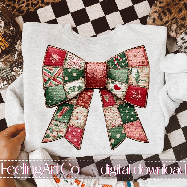 May include: A light gray sweatshirt featuring a large, patchwork bow design in red, green, and white. The bow has a variety of festive patterns, including snowflakes and hearts. The text "FeelingArtCo digital download" is at the bottom.