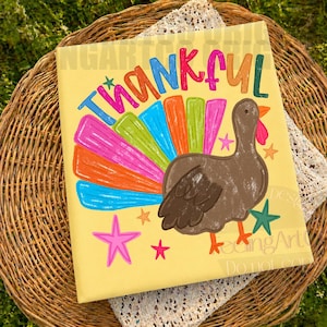 May include: A square canvas print with a yellow background featuring a brown turkey with a colorful, multi-colored fan-shaped tail. The word THANKFUL is written in large, multi-colored letters above the turkey, surrounded by small star shapes.