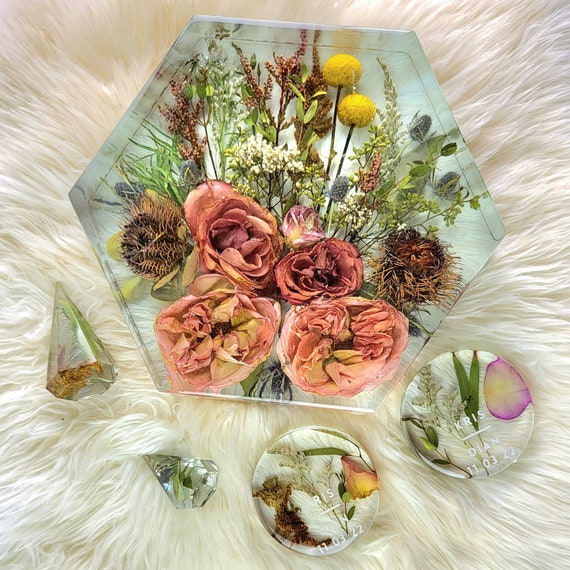 I dry and preserve flowers in resin for jewelry makingthese are my  overflow pieces I've yet to get to. The garden just keeps on giving. :  r/crafts