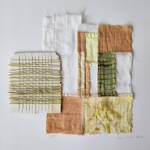 May include: Abstract textile artwork with a woven section and gold-coloured threads, alongside fabric patches in white, orange, green, and yellow. The piece is signed "bee-hale 2024".