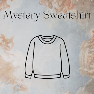 May include: A black and white line drawing of a crew neck sweatshirt on a light blue background with a painting of angels. The text "Mystery Sweatshirt" is at the top of the image and the text "@SUGARPEARL.CO" is at the bottom of the image.
