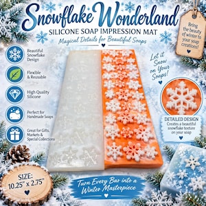 May include: A rectangular silicone soap impression mat measuring 10.25 inches by 2.75 inches, featuring a snowflake pattern. The mat is shown in a translucent white color alongside an orange bar of soap embossed with white snowflake designs.