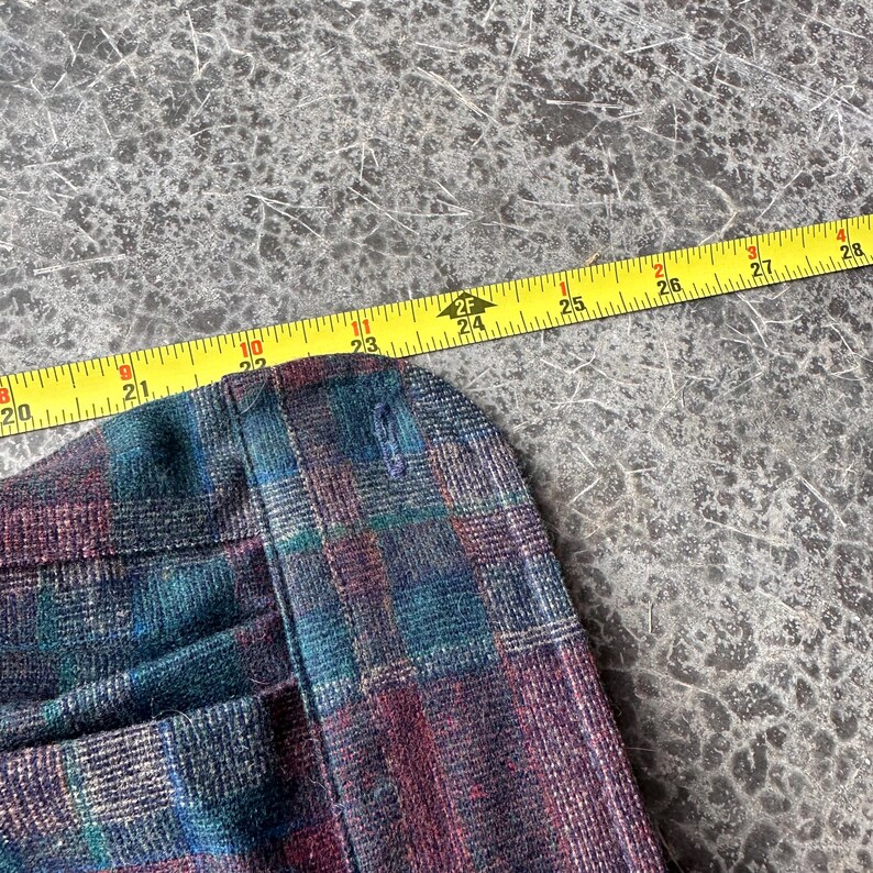 May include: A set of three ceramic mugs with a speckled, matte finish. The mugs are in shades of cream, light gray, and dark gray. Each mug has a simple, minimalist design, perfect for coffee or tea.