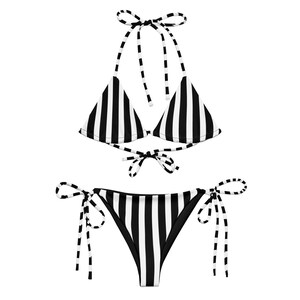 May include: Black and white striped bikini with a triangle top and a tie-side bottom.