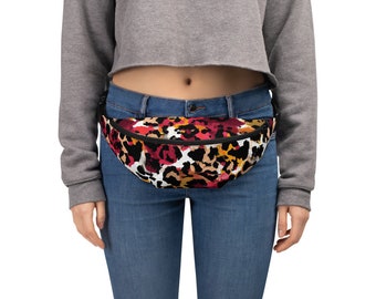 May include: A black fanny pack with a colorful leopard print design. The print features shades of red, orange, yellow, and white.