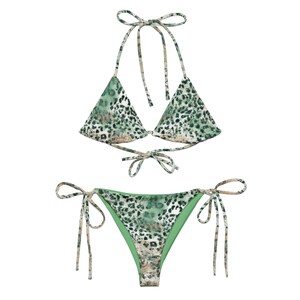 May include: Green and brown leopard print bikini with adjustable straps. The top is a triangle style and the bottom is a cheeky style with ties on the sides.
