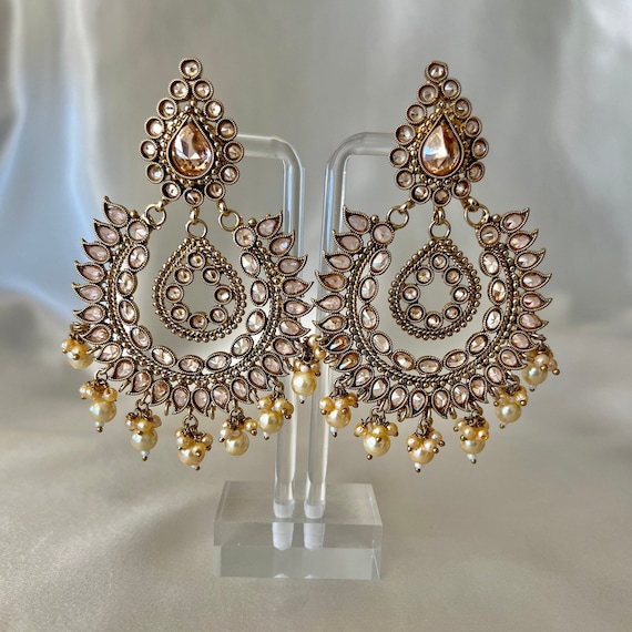 Laxmiji motif on top of oval flower design ruby stone earrings(L-5cm) –  Odara Jewellery