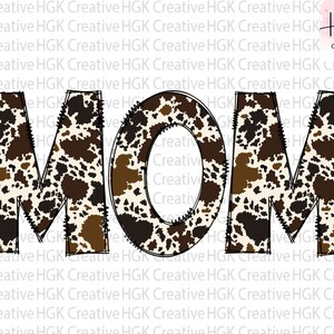 May include: The word "MOM" in black outlined letters with a brown and white cow print pattern.