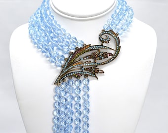 VINTAGE**MAGNIFICENT**RARE** Heidi Daus Cascading Waterfall Necklace Aquamarine Crystals Stunning Swirled and Bejeweled Center Pendant.