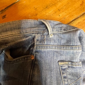 Woman’s True Religion High Rise Tapered Skinny distressed jeans size 29. image 10
