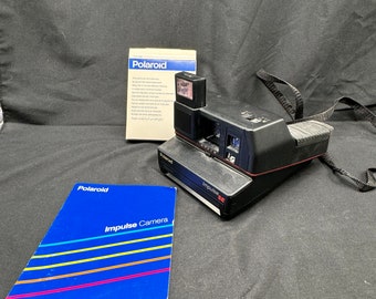 Vintage Polaroid Impulse QPS Sofortbildkamera mit Anleitung und 1 Schachtel Film