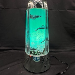 Vintage RABBIT TANAKA Silver Chrome Motion Lamp-dolphins-night