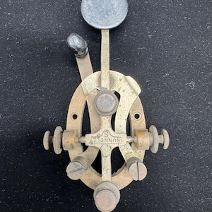 May include: A set of three ceramic mugs with a speckled, matte finish. Each mug features a different color: light blue, cream, and gray. The mugs have a simple, modern design and a comfortable handle.