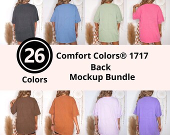 May include: A mockup bundle of Comfort Colors 1717 back t-shirts in 26 colors. The image displays various solid-colored t-shirts, including gray, blue, green, pink, brown, orange, lavender, and purple. The text on the image reads "26 Colors Comfort Colors 1717 Back Mockup Bundle."
