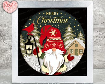 May include: A framed Christmas-themed artwork featuring a gnome with a long white beard and a red hat. The artwork includes a house, trees, and the words "MERRY CHRISTMAS". The background is dark green with white snowflakes.
