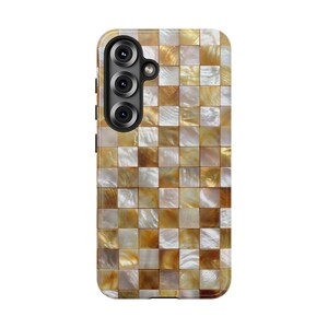 Vertical view of a phone case with an iridescent square tile mosaic pattern in shades of gold, brown, and white.