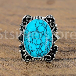 Handmade Sterling Silver Turquoise Ring: Elegant Oval Gemstone