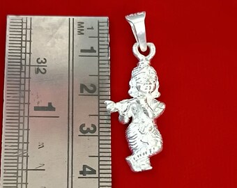 クリシュナ神ペンダント、フルーティング加工が施された