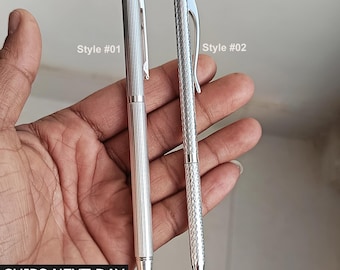 Elegante bolígrafo de plata de ley 925, punta mediana.