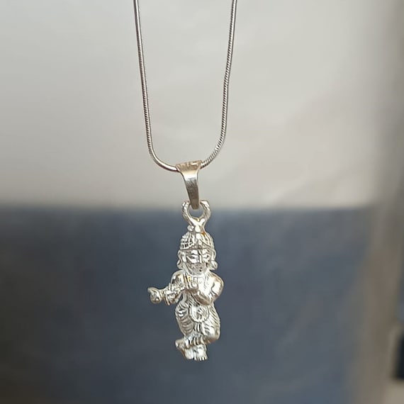 クリシュナ神ペンダント、フルーティング加工が施された