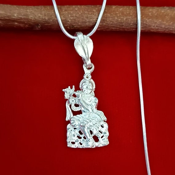 スターリングシルバーのクリシュナペンダント、神聖なフルーティング