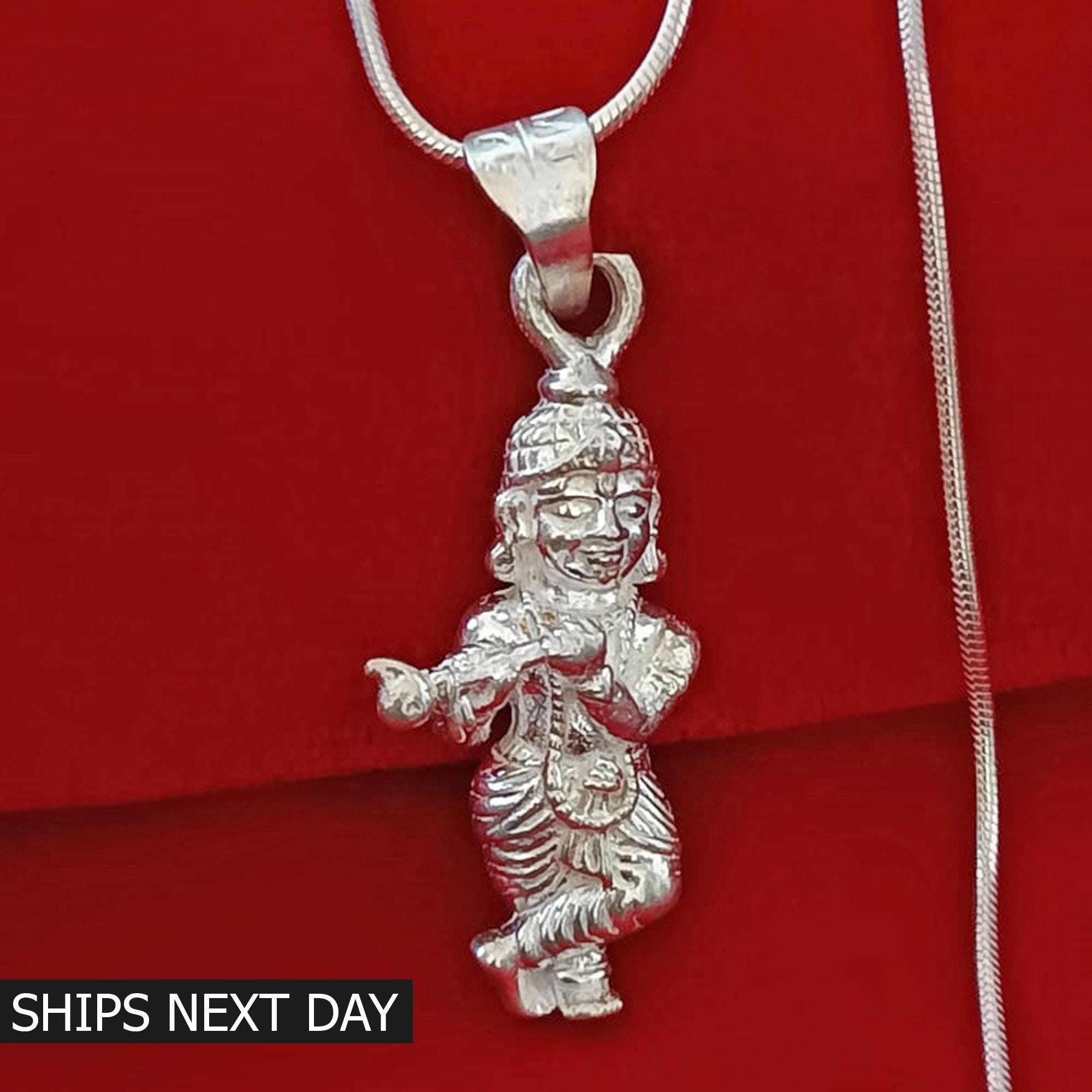 クリシュナ神ペンダント、フルーティング加工が施された