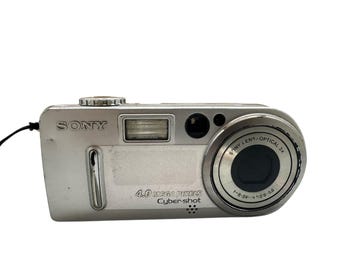 Sony Cyber-shot DSC-T9 (状態は悪いが、完全に動作する、バッテリーと