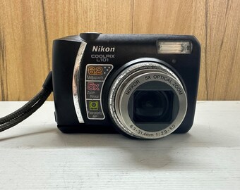 Nikon CoolPix L101 Digital Camera 6.2 MP 2.5 inches 5X Optical Zoom Compact Image Stabilization