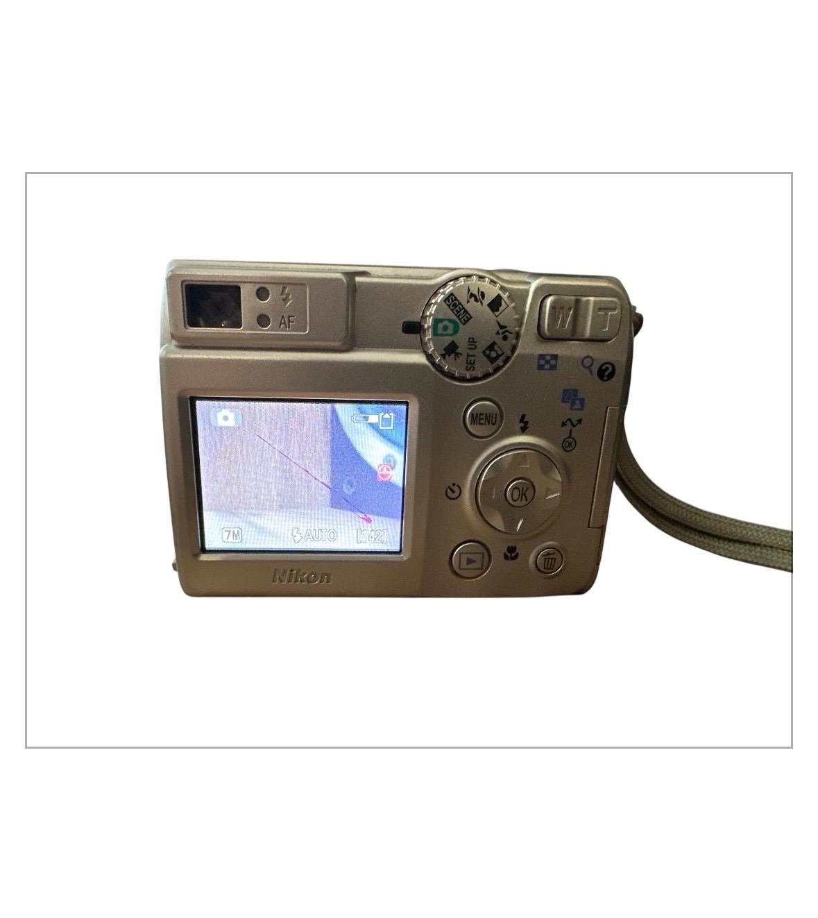 Nikon Coolpix 7600 7 MP Digital Camera 3x Optical Zoom 1.8 Inches