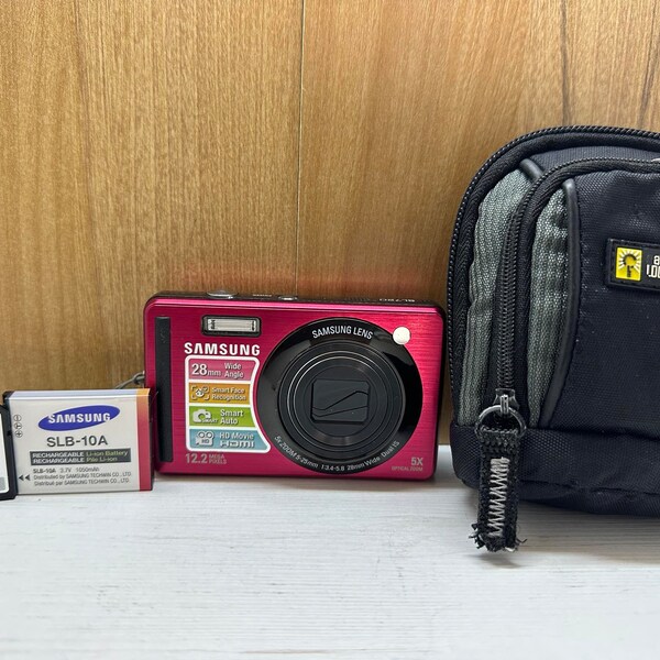 Samsung SL720 Digital Camera Compact 12 MP 5X Optical Zoom Smart Auto  + 4GB Memory Card, battery, case and handstrap