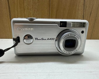 Canon PowerShot A400 Digital Camera 3.2 MP 3.2X Optical Zoom Three AA 1.5V Batteries + Handstrap
