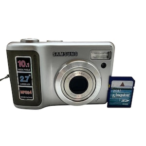 Câmera digital compacta Samsung S1030 10,1 MP, zoom óptico de 3x, LCD de 2,7 polegadas + 2 GB de memória interna