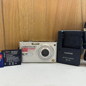 Panasonic Lumix Dmc-FX3 Digital Camera Compact 6MP 3X Optical Zoom 4GB Memory card, Charger, Cable and Battery image 1