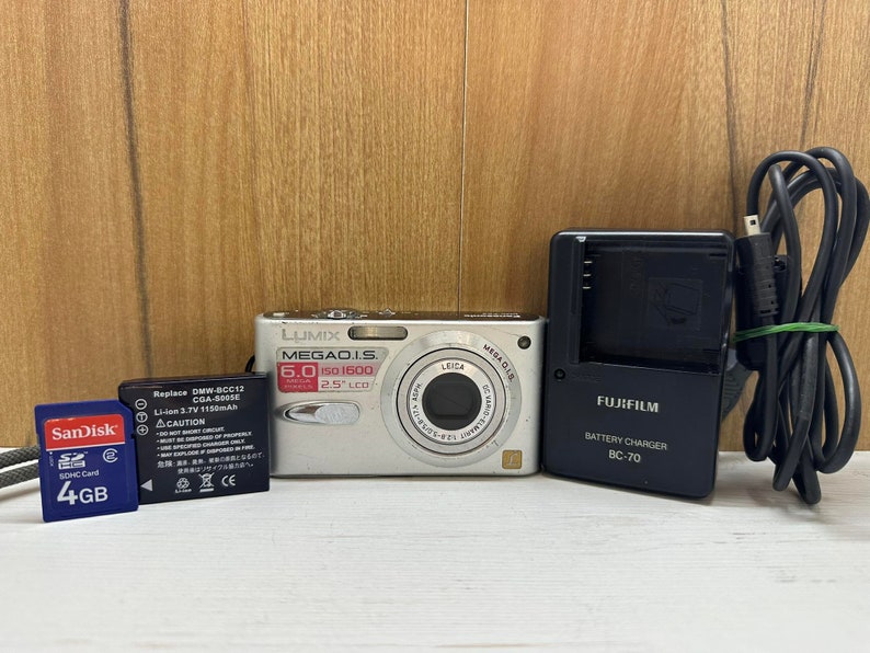 Panasonic Lumix Dmc-FX3 Digital Camera Compact 6MP 3X Optical Zoom 4GB Memory card, Charger, Cable and Battery image 1
