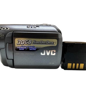 May include: A grey JVC hard disk camcorder with a 25x optical zoom lens and a 30GB hard drive. The camcorder has a black battery attached. The text on the camcorder indicates 14 hours of normal recording time and 7 hours of ultra-fine recording time.