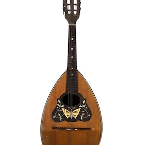 May include: A vintage mandolin with a wooden body and neck. The instrument features a butterfly inlay on the soundboard, with decorative floral accents. The mandolin has a dark brown headstock and a pear-shaped body.