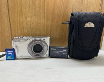 Casio Exilim EX H15 HD Digital Camera 14.1 MP 10X Optical 3 Inches Lcd Travel Ccd Shift Stabilization Compact Video 512 Mb Memory card