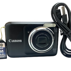 Canon Powershot A800 Digital Camera Compact Black 16 Shooting Modes Image Stabilisation 10 Mp 3.3x Optical Zoom LCD + 4GB Memory card, hands