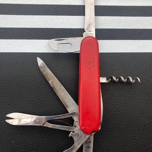 Vintage Victorinox Stainless Steel Switzerland Pocket Knife Unique