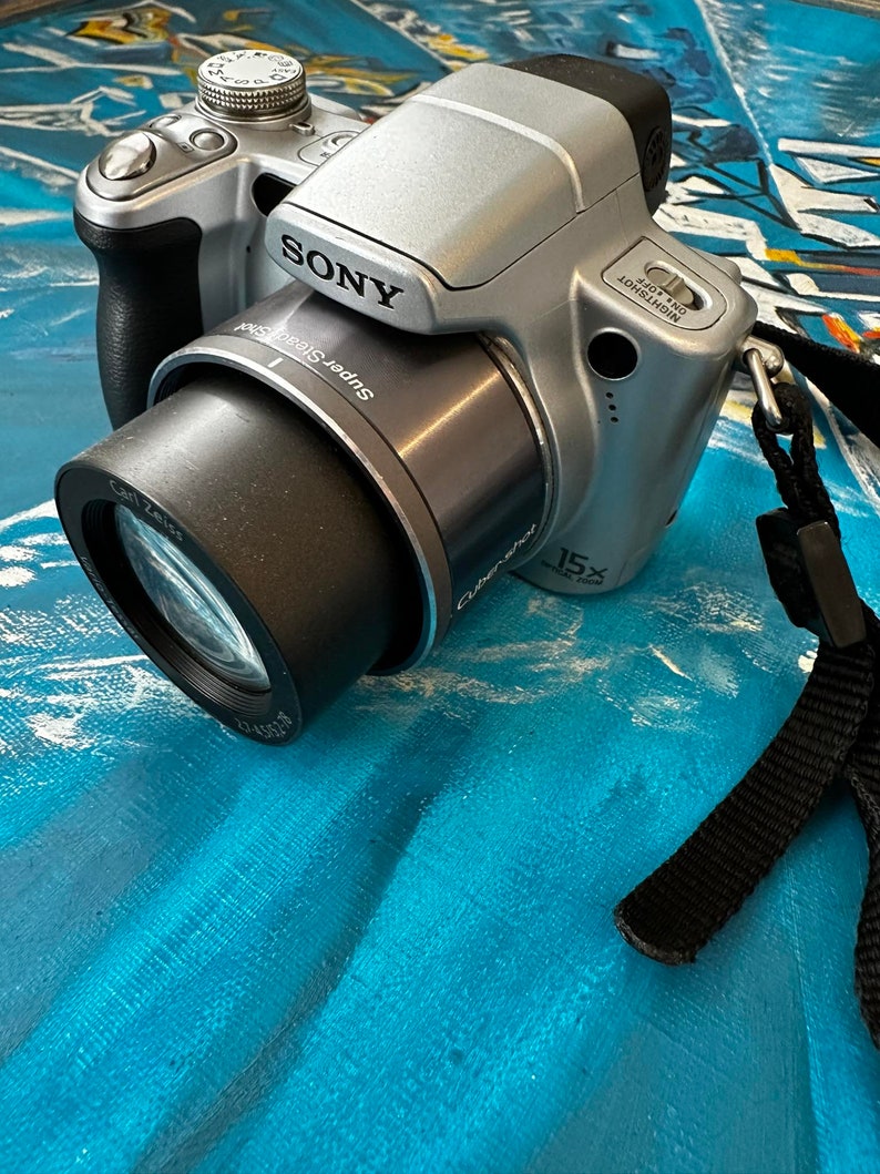 Fotocamera digitale compatta professionale Sony Steady-Shot DSC-H50 9,1 MP Zoom ottico 15x Zoom digitale 30X Schermo mobile da 3 pollici immagine 10