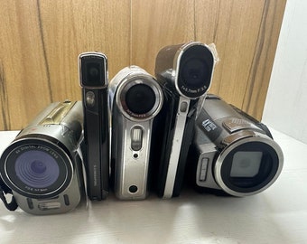 Lotto di 5 videocamere digitali Toshiba Digilite Digicam Silver crest Per parti o non funzionanti Problemi diversi Vedi descrizione