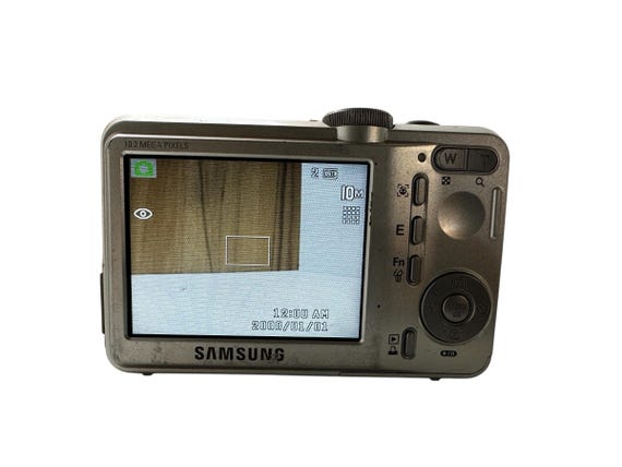 Samsung S1060 Digital Camera Compact 10.2. MP 5x Optical Zoom 2.7