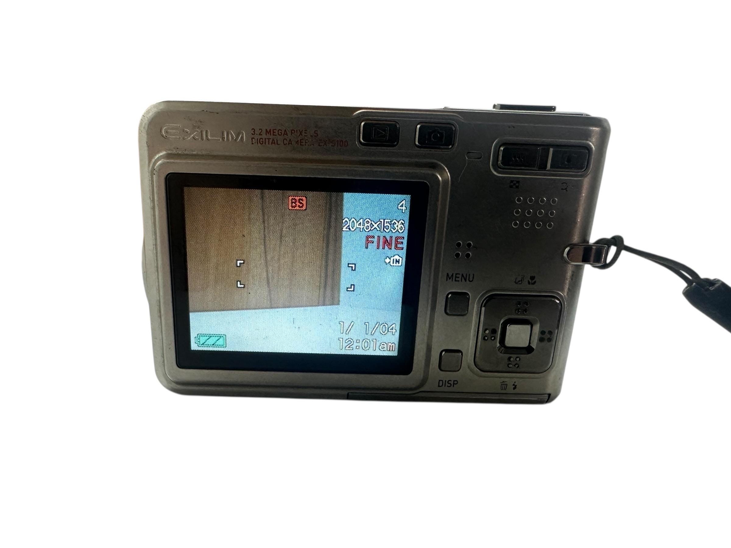 Casio Exilim Ex S100 Digital Camera 3.2 Mp 2.8 Optical Zoom 2 
