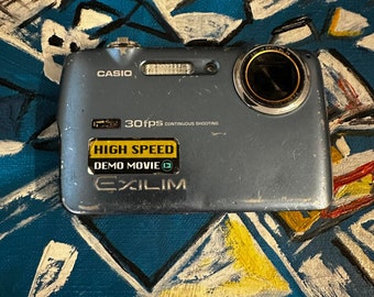 Casio Exilim EX-FS10 9.1 MP Digital Camera 3x Optical Zoom 2.3 Inches LCD Compact