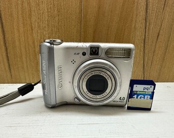 Canon Powershot A520 Digital Camera 4MP 4X Optical Zoom Made in Japan 13 Shooting Modes Compact + 1 GB Memory Card