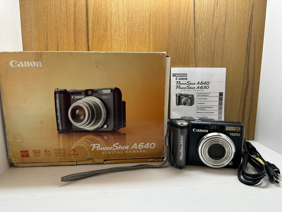 Synergy Digital Camera Battery Charger Kit - 4 AA NiMH 2800mAh Batteries With Universal Charger For Canon Powershot A640